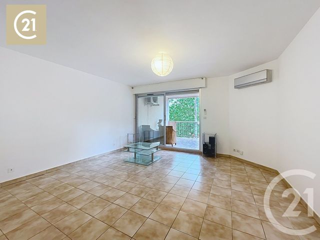 Afficher la photo en grand Appartement F3 à vendre - 3 pièces - 77.35 m2 - BEZIERS - 34 - LANGUEDOC-ROUSSILLON - Century 21 Comminges Immobilier