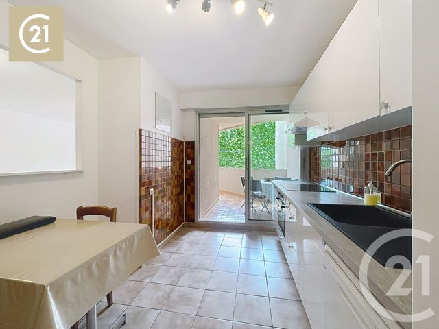 Afficher la photo en grand Appartement F3 à vendre - 3 pièces - 77.35 m2 - BEZIERS - 34 - LANGUEDOC-ROUSSILLON - Century 21 Comminges Immobilier